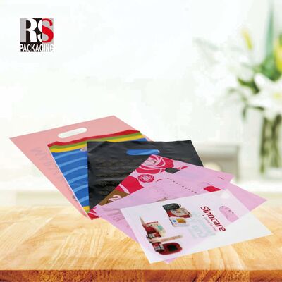 Αγορά Προσαρμοσμένη τσάντα χειρισμού πλαστική συσκευασία χειρισμός τσάντες αγορών ελαφρύ και φορητό σχεδιασμό επιφανειακή εκτύπωση μοτίβων online manufacture